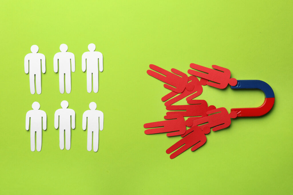 Visual of a magnet attracting prospects, representing effective lead generation strategies to capture new customers.